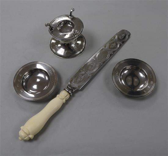 A Victorian provincial silver presentation serving knife, Newcastle 1876, a silver stamp dampener and two silver dishes.